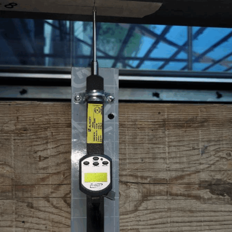 PileSense™ 4" BlueDial in action measuring mullion deflection