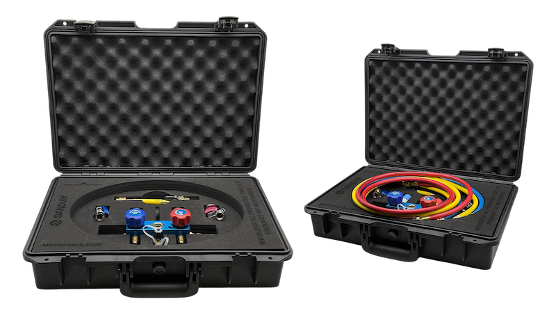 AC Kit displaying wireless accessory contents including valves, fittings, and color-coded hoses for Sandvik SHOT Kit