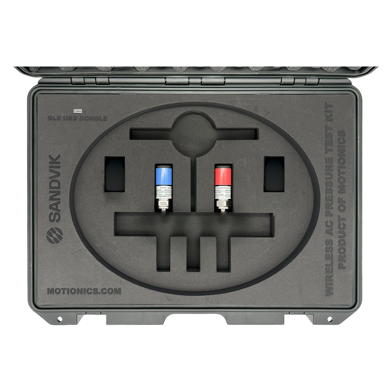 Sandvik SHOT AC Retrofit Kit interior view showing wireless pressure sensors with red and blue caps in foam case by Motionics