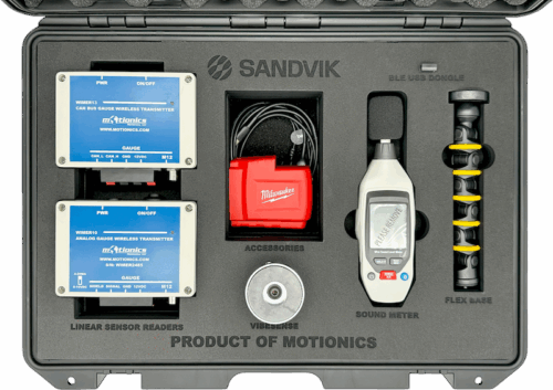 Interior view of Sandvik SHOT Inspection A-Kit by Motionics featuring wireless sensor readers, sound meter, and accessories